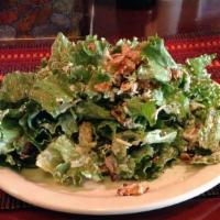 Caesar Salad · Romaine lettuce, croutons, anchovies and pecorino.