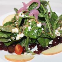 Spinach · Baby spinach with glazed walnuts, apples, grapes, Feta cheese with honey mustard dressing.