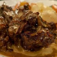 Short Ribs · braised beef short ribs with marssala wine sauce and bleu cheese sauce