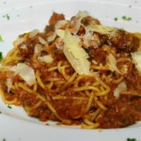 Bolognese · With fettuccine, classic meat sauce and meatballs.