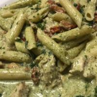 Penne Pesto · With sliced chicken, roasted tomatoes, spinach in creamy pesto.