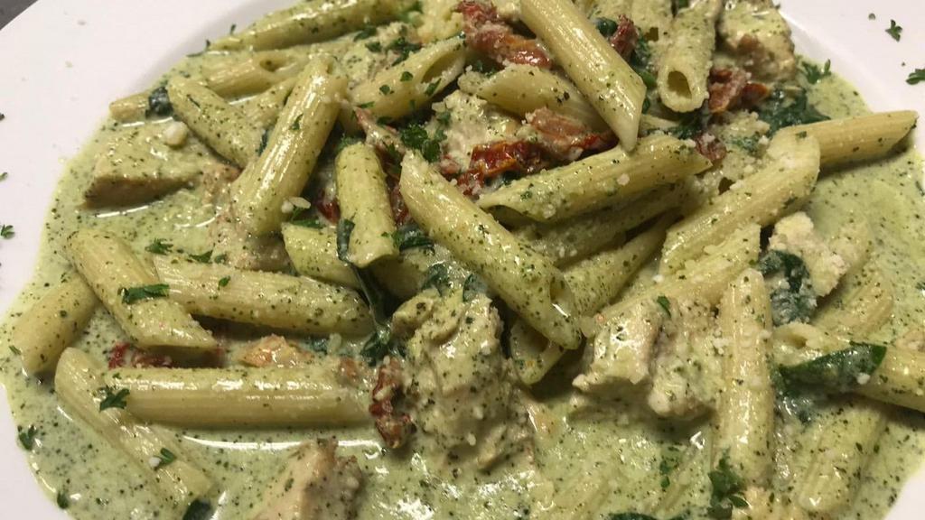 Penne Pesto · With sliced chicken, roasted tomatoes, spinach in creamy pesto.