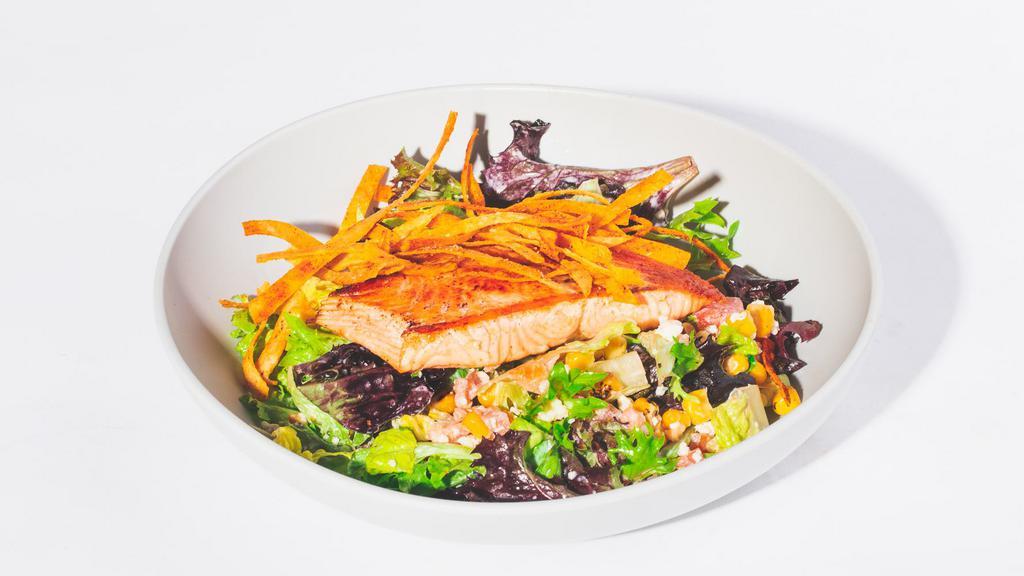 Salmon & Street Corn Salad · seared salmon served with mixed greens, roasted corn, tomatoes, cotija, dressed with honey-lime ranch and garnished with crispy tortillas