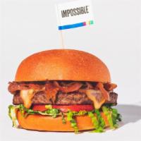 The Impossible(Tm) Burger · plant-based patty, smoked cheddar, lettuce, caramelized onions, housemade chili spiced tomat...