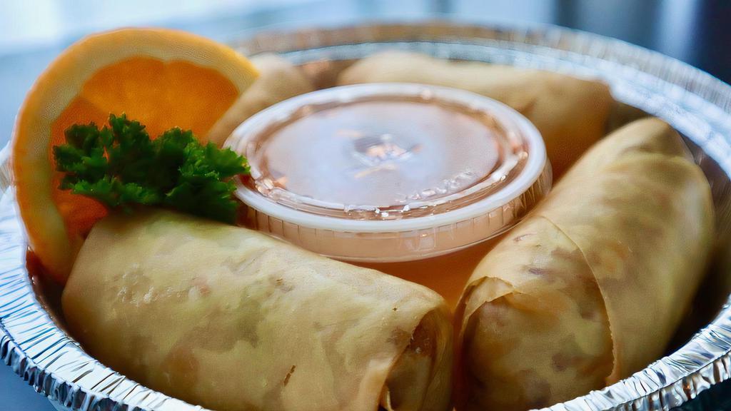 Thai Rolls (Vegetables) · Crunchy spring rolls stuffed with silver noodles, white cabbage, king mushrooms, taro and celery, served with sweet and sour sauce.