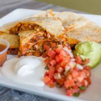 Super Quesadilla · Large flour, wheat or spinach tortilla, choice of meat, grilled cheese, sour cream, guacamol...