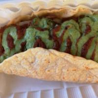 Mami Cheli's Vegan Quesadilla · Homemade corn tortillas, (vegan meat or grilled mushrooms), beans, vegan cheese, cilantro, o...