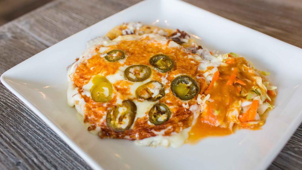 Cheesy Pupusa · Your choice of pupusa topped with grilled cheese (dairy). Jalapeños optional.