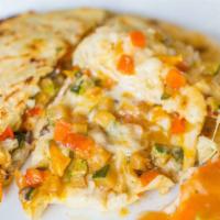 Veggie Pupusa · Corn flour dough with stuffed cheese, pre-mixed vegetables (grilled carrots, zucchini, bell ...