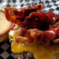Bacon Cheeseburger · The burger is cooked medium unless requested.