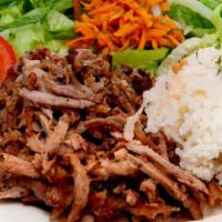 Beef Shawarma Plate · Sam's classic beef shawarma slices, served with side of hummus, mediterranean rice, and salad.