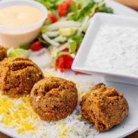 The Falafel Plate · Fresh fried chickpeas tossed with side of hummus, mediterranean rice and salad.