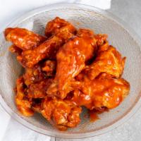 Buffalo Wings 12 Pieces · Baked instead of fried for full flavor, but half the fat. Plump chicken wings tossed in the ...