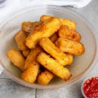 Mozzarella Sticks 8 Pieces · Breaded and fried whole milk mozzarella sticks. A perfect side to any of our dishes.