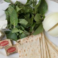 Herbs & Feta Cheese · Selection of seasonal herbs and feta cheese served with wheat valley lavash bread.