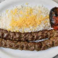 Koobideh (9 oz. Per Skewer) · Ground sirloin with seven special spices and grated onions cooked within. The Persian signat...