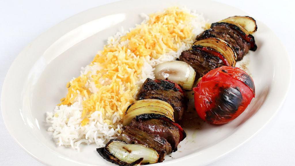 Shish Kabob · Thick chunks of filet mignon marinated in our special seasoning, fire grilled with red peppers and onions.