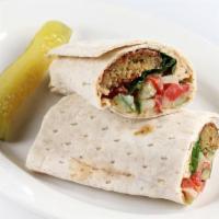 Persian Way · Falafel, hummus with red white and green (shirazi) mixed together and wrapped in lavash bread.