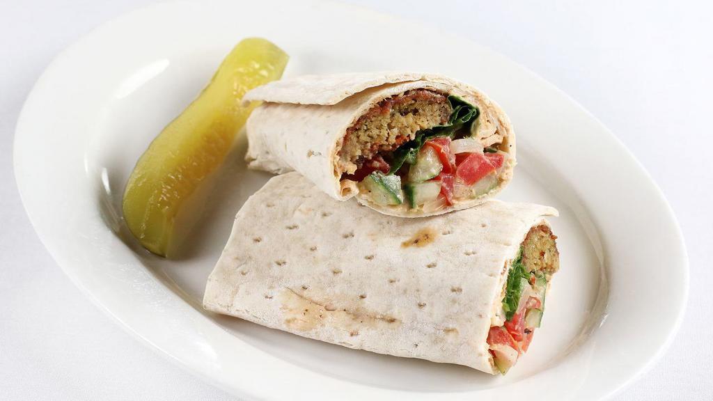 Persian Way · Falafel, hummus with red white and green (shirazi) mixed together and wrapped in lavash bread.
