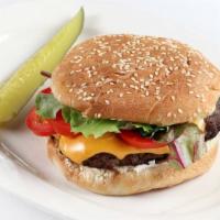 American Classic Burger · 1/2-pound sirloin beef, mayo, lettuce, tomatoes, onion served on a sesame bun.