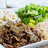 Lamb Beef Doner Plate · Lamb and beef, cooked on a vertical spit, thinly sliced.