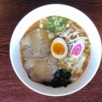 Miso Ramen · Noodles in soybean paste flavored soup, topped with slices of pork, 1/2 boiled egg, bean spr...