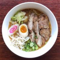 Chicken Ramen · Noodles in soysauce flavored soup, topped with chicken(thigh strips), 1/2 boiled egg, bean s...