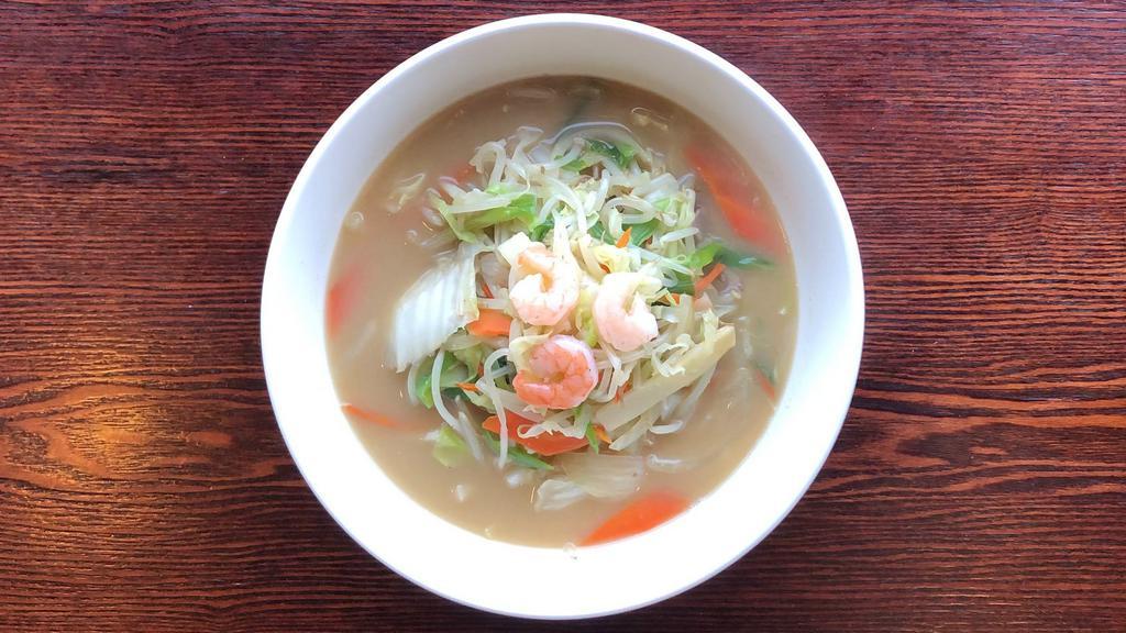 Tanmen · Noodles in clear soup, topped with an assortment of cooked cabbage, bean sprouts, shrimp, pork and other vegetables.