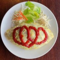 Omelet Rice · Fried rice with ham, pork, and shrimp, wrapped with egg omelet, and topped with ketchup. 
(N...