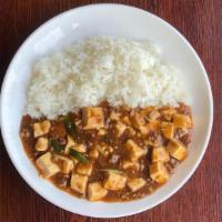 Mabo Rice · Tofu and ground pork cooked in spicy sauce, poured over rice.