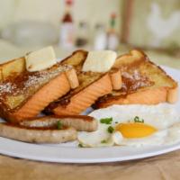 A4. French Toast and Egg · Three slices of thick French toast with choice of one egg any style, choice of two bacon str...