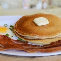 A2. Delight Special · Two ﬂuffy pancakes, choice of 2 sausage links, 2 bacon or grill ham and one egg any style.
