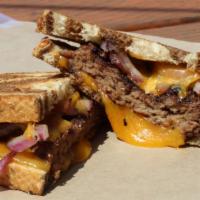 F5. Patty Melt · Ground beef patty, grilled onion and melted cheese on rye bread.