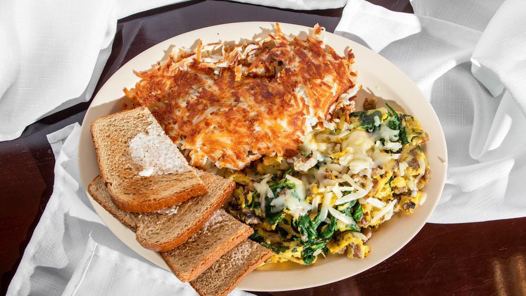 Emil's Ultimate Scramble · Spinach, diced country sausage, onion, mushrooms and Pepper Jack cheese.