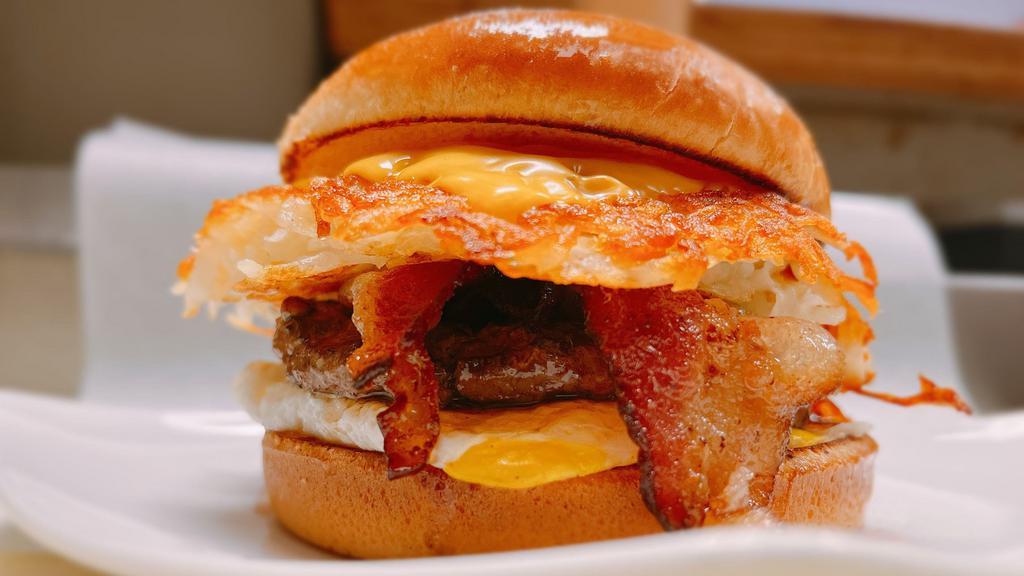 Morning Burger · Fresh Beef Patty with Smoked Bacon, Egg, Hash Browns, Cheese, Tomato & Emil's Sauce
