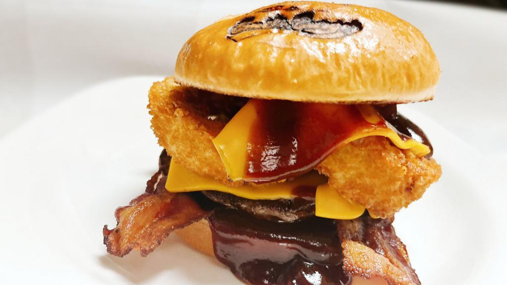 Western Burger · With ONLY BBQ sauce, bacon, onion rings and Double cheese on Brioche Bun