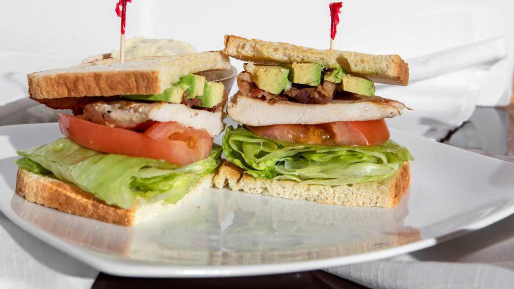 Chicken Breast Club · Chicken breast,  bacon, avocado, lettuce, tomato & mayo on Sourdough or your choice of bread (wheat, white, rye, french roll)