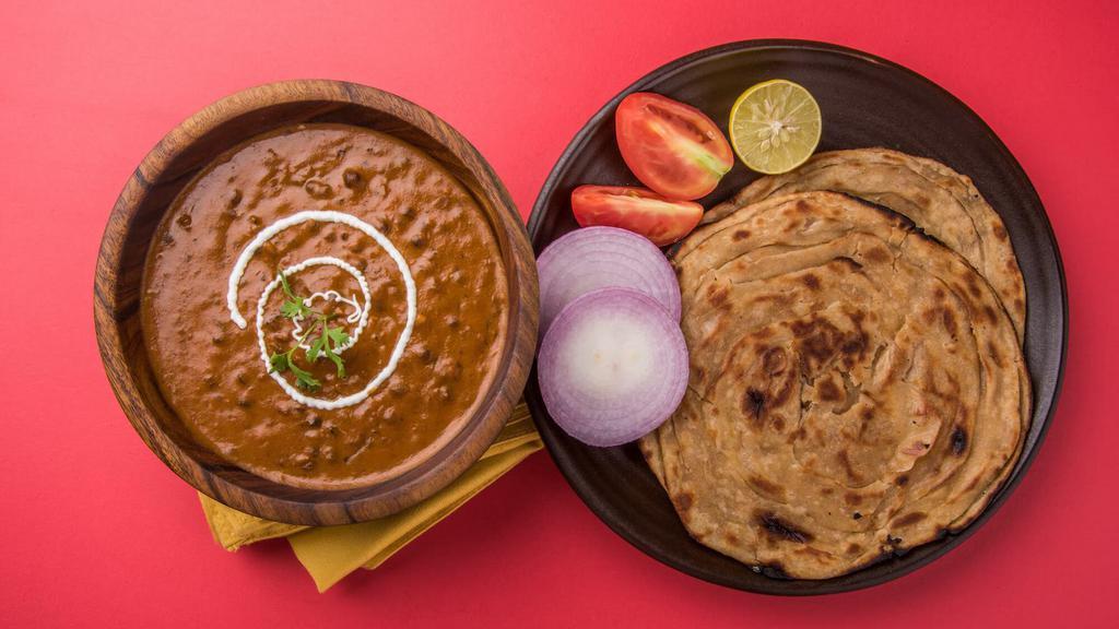 Lachedar Parathas (2) with Dal Makhani Combo · Two multi-layered flaky indian flatbreads prepared with buttery black lentils.