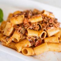 Ponderosa · Creamy tomato sauce, porcini mushrooms, shallots & pancetta