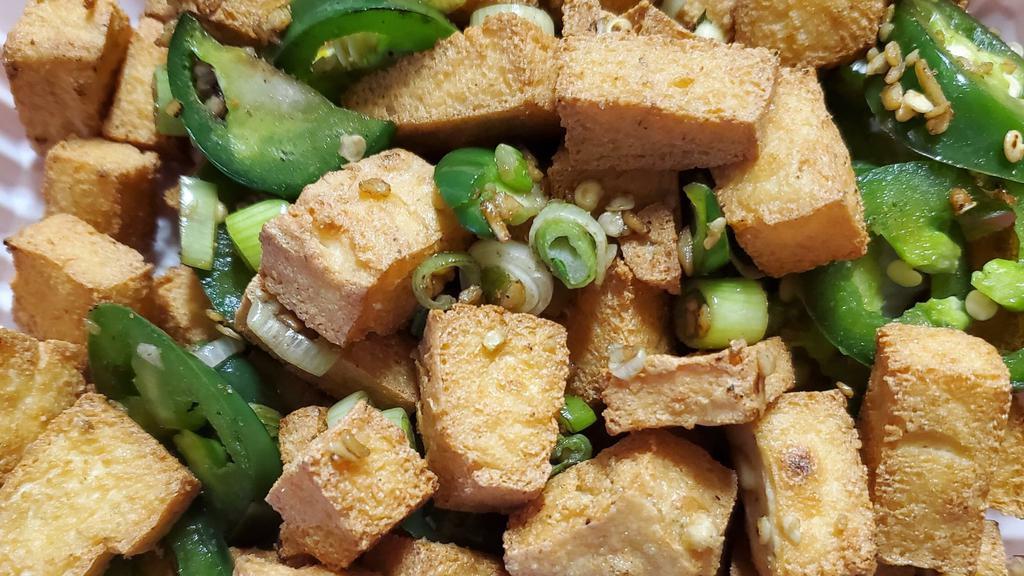 Salt & Pepper Tofu · Braised tofu sautéed with jalapeño and green onion and garlic