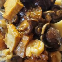 Seafood with 2 Kinds of Mushroom Clay Pot · Squid, shrimp, fried fillet fish, mushroom and black mushroom