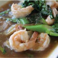 C05. Rad Nar Noodle · Thai style gravy sauce with Chinese broccoli and your choice of meat served over stir-fried ...