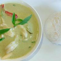 D02. Green Curry · Thai green curry with your choice of meat, bell pepper, little corn, bamboo shoot, green bea...