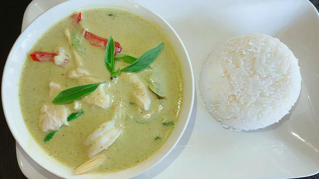 D02. Green Curry · Thai green curry with your choice of meat, bell pepper, little corn, bamboo shoot, green bean, and basil.