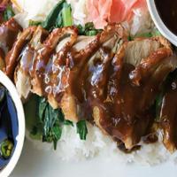 F11. Roasted Duck Over Rice · boneless roasted duck breast with yao choy topped with homemade Thai style duck sauce.