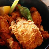 Karaage Fried Chicken · Five pcs marinated fried boneless chicken thigh with daikon radish ponzu.