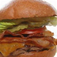 The Iowa Burger · A mouth-watering six-ounce burger served with bacon, cheddar cheese, tangy caramelized red o...