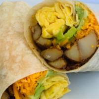 Vegetarian Breakfast Burrito · A nice number with onion marmalade, 2 eggs, melty cheddar, home fries ＆ avocado.