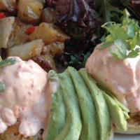 D'orsay Poached Eggs · Two poached eggs, crab cake, avocado, roasted pepper aioli on English muffins, served with h...