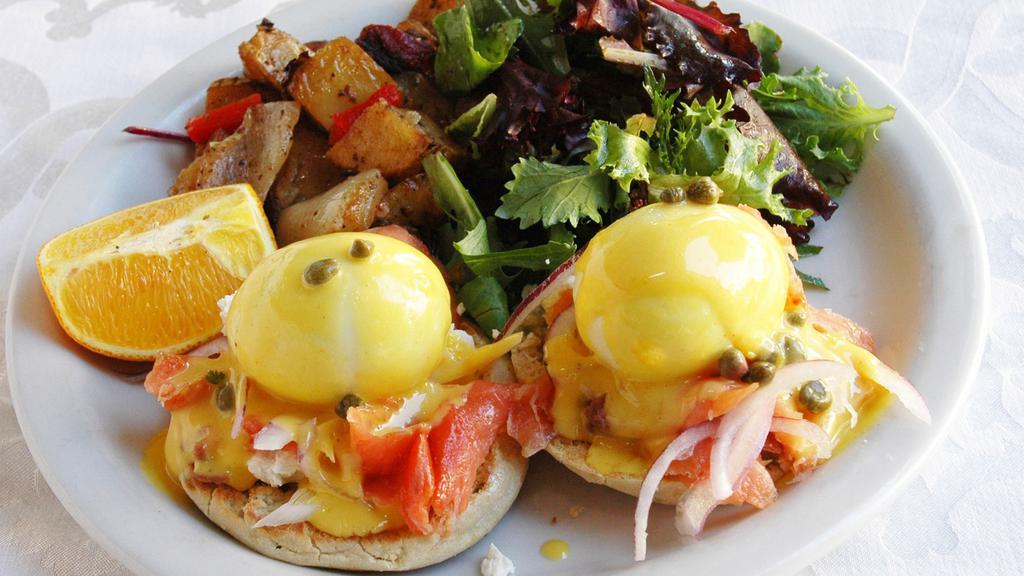 The Tate Poached Eggs · Two poached eggs with smoked salmon, goat cheese, red onions and capers on English muffins, served with hollandaise and home-fried potatoes.
